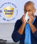 Man using On-The-Go Pocket Pack Facial Tissues 8 Pack Bundle, 3-Ply Tissues With 10 Per Pack, 80 Total, with Clean Shield tech.