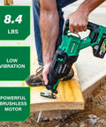 Person using Cordless Reciprocating Saw With 36V MultiVolt, 4-Stage Speed Selector Range 1,700 To 3,000 SPM on wood