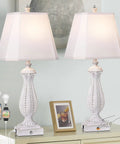 Farmhouse Table Lamps Set Of 2 With Oil Rubbed Bronze Finish Three Way Dimmable Touch Control Nightstand Lamps Built In AC And USB Outlet Linen Shade Great For Living Room Or Bedroom, shown on a table with accessories.