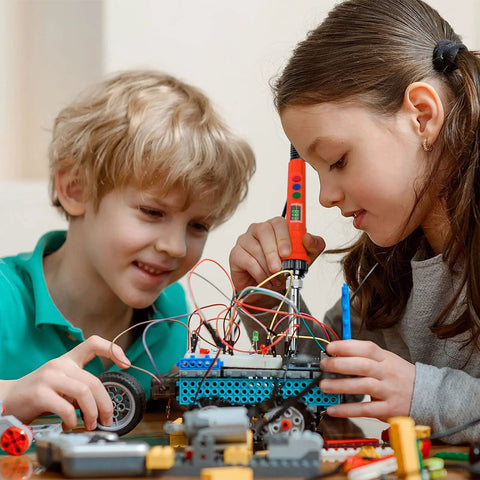 Kids using 120W Digital Soldering Iron For DIYers With LED Display, Quick Heat Ceramic Heater From 356F To 932F on robotics project