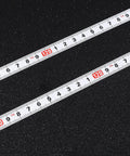Close-up of Six Pack Adhesive Flexible Tape Measures Set, 1m and 2m lengths with metric readouts on black background.