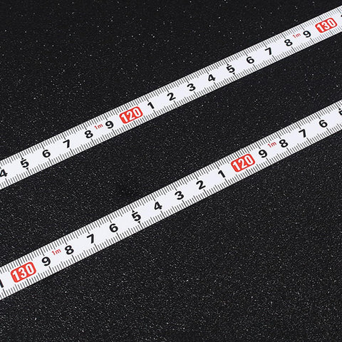 Close-up of Six Pack Adhesive Flexible Tape Measures Set, 1m and 2m lengths with metric readouts on black background.