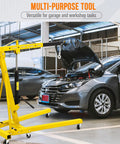 Heavy Duty Folding Engine Hoist With Adjustable Telescopic Boom Two Ton Cherry Picker for Garage Workshop in use.