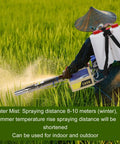 Person using Portable Pulse Water Mist Fogger Electric Sprayer with 15L stainless tank in a field, spraying mist over crops.