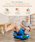 Man using Legit 4D Curved Vibration Plate Exercise Machine With Triple Motor Seven Modes And Sixty Speeds in a home setting.
