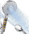 Chrome handheld shower head with transparent filter chamber showing beads; detachable, high-pressure 9-spray.