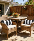 Outdoor Indoor Lumbar Pillows Pack Of 2 Cushions For Patio And Home Sofa Use Water Repellent Fluffy All Weather Cushions 12x20 Inch Cabana Black displayed on wicker chairs in outdoor setting.