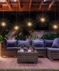 4 Pack Copper Wire Starburst Fairy Lights 200 LED Firework String Lights With 8 Modes Dimmable Remote Waterproof Outdoor Patio Decor For Parties Christmas Battery Operated over outdoor seating area