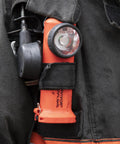 Survivor 175-Lumen Rechargeable Firefighter Right-Angle Flashlight clipped on turnout gear, rugged orange body, IPX4 water resistant.