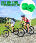 Mountain bikers riding with Bike Tire Liner Set for Mountain Bikes 2 Liners Puncture Protection to stop thorns in the tube.