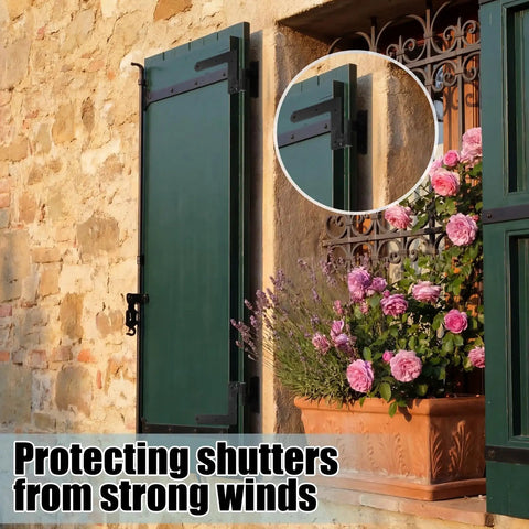 Heavy Duty Steel Blind Shutter Hinges 8 Pack With S Holdback Hook 1-1/16 Inch Black Powder Coat exterior window shutters secured to stone wall.
