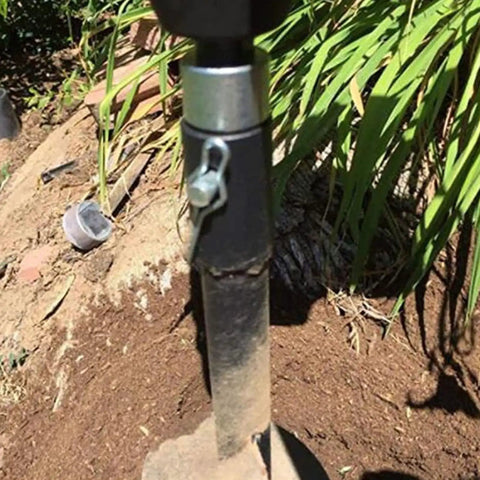Earth Auger Adapter for 1 to 3 garden drill bits in use with power drill in soil, carbon steel, 1/2 inch thread, round shank visible