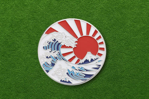 Ukiyoe Wave Golf Ball Marker With Magnetic Hat Clip Made From Zinc Alloy Durable Accessory For Golfers Dope Gift For Fans Of Japanese Art And The Great Wave Theme On The Green, featuring a red sun design and Japanese wave art.