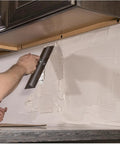 Person using Two Sided U Shaped Notched Trowel With Aluminum Shank Riveted To A Steel Blade Sixteen By Four Inch Pro Grade Durasoft Handle for mortar application