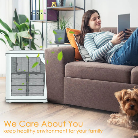 Woman relaxing on couch with air purifier, showcasing Replacement Filter Set For Holmes HAPF600 Series Air Purifiers With 3 HEPA Filters.