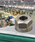 Fabaletta ER Collet Clamping Nut High 20CrMoTi Steel for CNC Milling on workbench in machining factory.