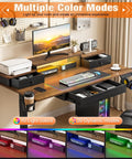 48 Inch Electric Standing Desk With Ambient Led Lighting And Three Memory Presets Height Adjustable Sit Stand Worktable with keyboard, monitor, and cable storage.