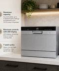 Sleek Compact Countertop Dishwasher With Delay Start And Seven Wash Cycles Portable Kitchen Essential Featuring Stainless Steel Interior six place setting capacity placed on a countertop with LED digital display.