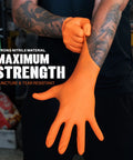Kickass Heavy Duty 8 Mil Orange Nitrile Gloves With Diamond Textured Grip, Latex And Powder Free For Industrial Mechanic Shops, Ultra Thick Chemical Resistant Protection, 10 Pack Large, worn by a mechanic.