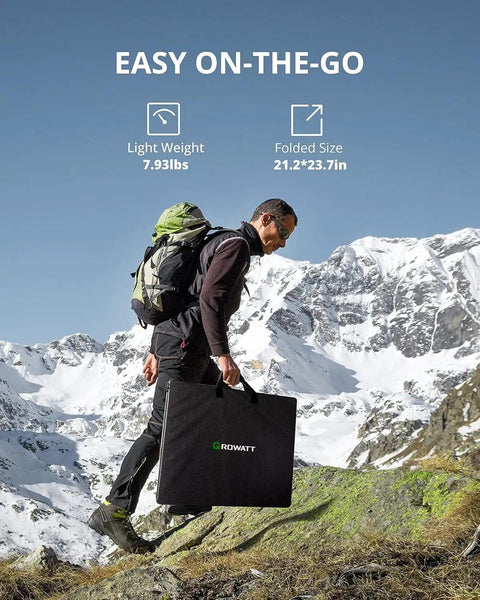Man hiking with 200W Portable Solar Panel For Power Station With Foldable Design And Adjustable Kickstands against snowy mountains.
