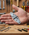 Beefy 6 Pack Heavy Duty Strap Hinges 4 Inch Iron T Shape With Mounting Screws For Light Masonry Door Frames Exterior And Residential Use 180 Degree Opening Durable Silver Finish, silver hinge in hand