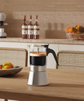 Induction Friendly Moka Pot With Crystal Glass Top And Stainless Steel Stovetop Espresso Maker Pro Level Brew Classic Italian Coffee Brewer 160ml Transparent Glass Body For Easy Brew Control Durable And Easy To Clean on kitchen table
