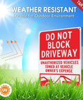 No Messing Around Heavy Duty Do Not Block Driveway Sign 14 By 10 Inches Rust Proof Aluminum Tow Warning Notice in grass.