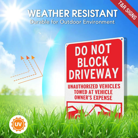 No Messing Around Heavy Duty Do Not Block Driveway Sign 14 By 10 Inches Rust Proof Aluminum Tow Warning Notice in grass.