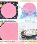 Premium Top Shelf 67 Piece Cookie Decorating Kit With Smooth Turntable Pro Brushes Scribe Needles Non Slip Pads Fresh Piping Bags For Totally Sick Cake Artists, pink silicone pad with scale markings and water splash.