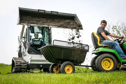 Heavy Duty Lawn And Garden Trailer With 900 Lb Capacity 15 Cu Ft Poly Tub Tilt And Pivot Frame in use on grassy field