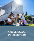 Blue 8 Foot Canopy Shelter With UPF 50 Plus Sun And Rain Protection Two Patented Side Panels For Privacy in a sunny park setting
