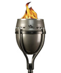 Close-up view of 65 Inch Outdoor Torch With Amped Up Extra Large Flame For Patio Garden Lawn And Backyard Weather Resistant Refillable And Decorative Torch In Silver Finish Twist And Pour Refilling For Mess Free Fueling.