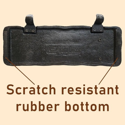 Bottom view of Top Shelf Cast Iron 3D Train Christmas Stocking Holder with scratch resistant rubber base for stability.