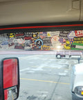 Truck window covered with Blue Collar Humor 100 Pack Waterproof Hard Hat Stickers For Tool Boxes Welding Helmets and Mechanics.