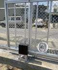 Heavy-duty v-groove caster wheel showcasing smooth rolling on an industrial gate setup, ideal for heavy carts and equipment.
