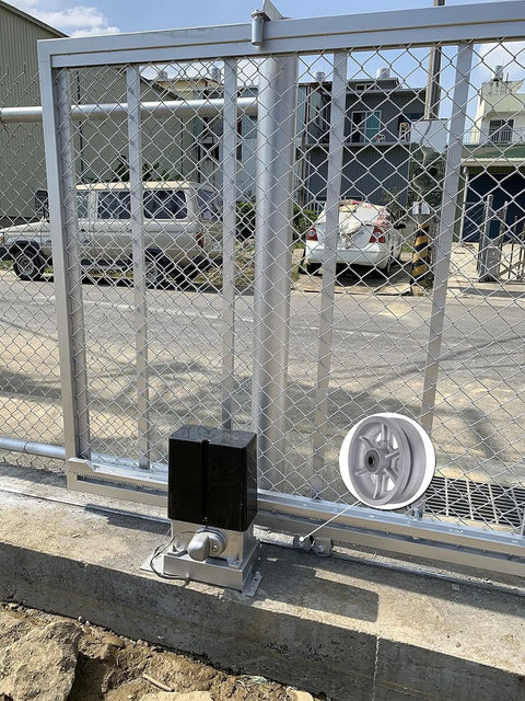 Heavy-duty v-groove caster wheel showcasing smooth rolling on an industrial gate setup, ideal for heavy carts and equipment.