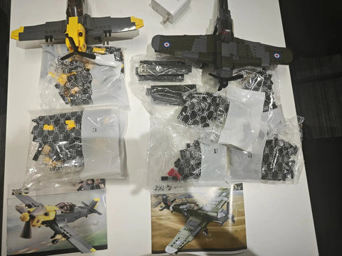 World War II Spitfire And BF109 1 To 32 Scale Building Block Set 2 In 1 Dual Model Kit Contents on Display