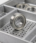 Beefed Up RC Vehicle Bearing Kit 30 Pcs Fits WLtoys One Fourteen 144001 Upgrade Kit With Precision Metal Bearings For Sturdier Wheels And Smoother Rides In RC Cars. metal bearing in tray