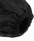 Close-up of the cuff opening of Slick Shield Waterproof Arm Sleeves, Heavy Duty Oilproof Kitchen And Garage Crew Work Guards, Black.