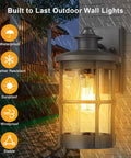 Outdoor Wall Sconce Lighting Fixture Finished In Black With Seeded Glass Set Of 2 For Exterior Walls Perfect For Entryways Porches Patios And More Durable Metal Exterior Lighting 7.5 In Tall 6.5 In Wide 12.2 In High, illuminated at night on a wall