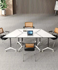 Foldable Office Desk With Hella Smooth Rolling Wheels And Rock Solid Steel Frame, Adjustable Mobile Computer Workstation For Compact Spaces, No Sweat Assembly, Durable Study Table For Modern Home Setups with laptop and chairs.