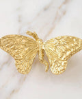 Heavy Duty Butterfly Cabinet Knobs With Slick Brushed Gold Finish For Dressers Crafted From Legit Solid Brass featuring smooth wings.