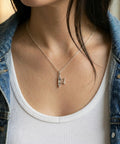 Woman wearing Outrigger Canoe Charm Necklace For Women Sterling Silver Dainty Handmade Ocean Boat Pendant 18 Inch Minimal Layering Jewelry