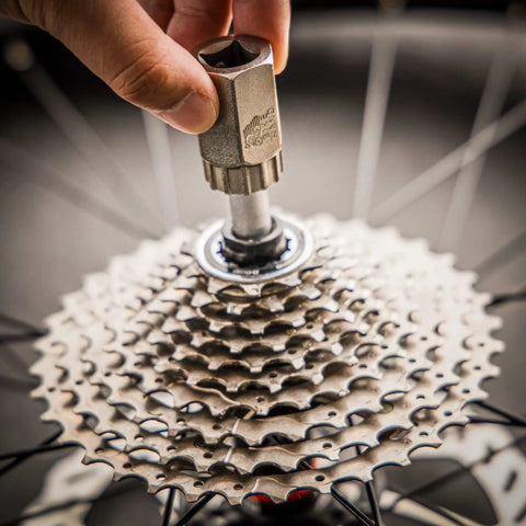 Hand using Shimano And Sram Cassette Lockring Tool for quick hassle free install and removal of 12 internal spline cassettes.