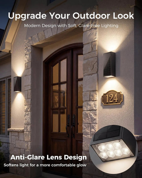 Rugged As Nails 2 Pack Solar Wall Lights Outdoor IP65 Waterproof, modern black up down sconce mounted by front door.