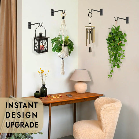 Heavy Duty Wrought Iron Plant Hanger Set Of Two For Indoor Or Outdoor Use Metal Wall Bracket Hooks with plants, lantern, wind chime hanging on wall