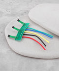 Four Pack Hall Sensor Pcb Board 41F Nifty Swap For Brushless Hub Motors Featuring Bang On 120 Degree Placement And Spot On 17 Millimeter Spacing For Sweet E Bike And Scooter Cruising with colorful wires.
