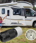 Badass 50 Amp Generator Plug Nema SS2-50P Four Pin Straight Blade Twist Locking Connector close-up with RV in background.