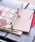 Woodworker using Matchfit Dovetail Hardware Kit One Inch Six Piece For Jigs With 360-Degree Motion on dovetail grooves grid.