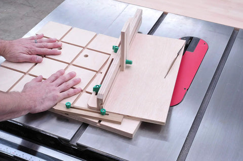 Woodworker using Matchfit Dovetail Hardware Kit One Inch Six Piece For Jigs With 360-Degree Motion on dovetail grooves grid.